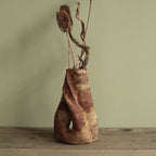 Red cave vase