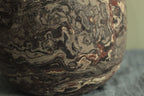 Crumpled geology vase