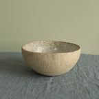 Beige bowl with silky white glaze