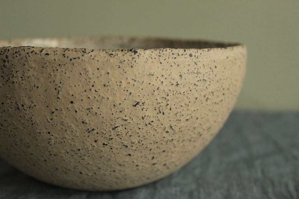 Beige bowl with silky white glaze