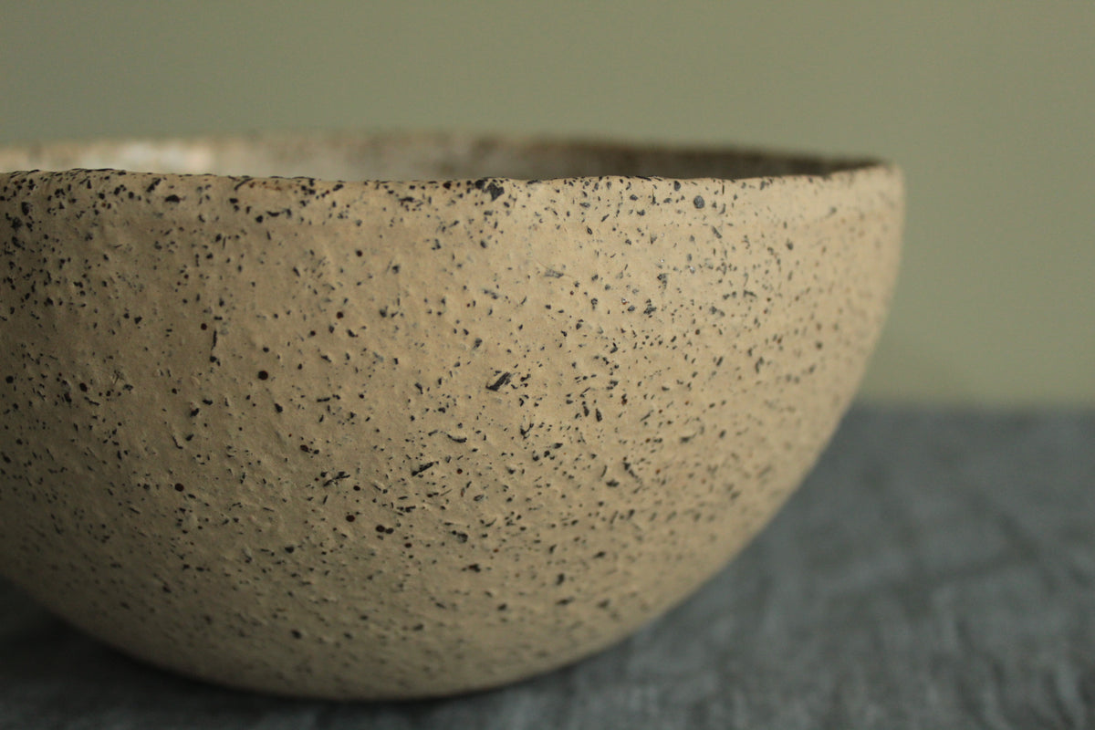 Beige bowl with silky white glaze