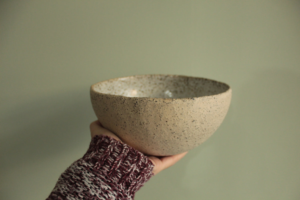 Beige bowl with silky white glaze