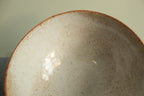 Yellow bowl with silky white glaze