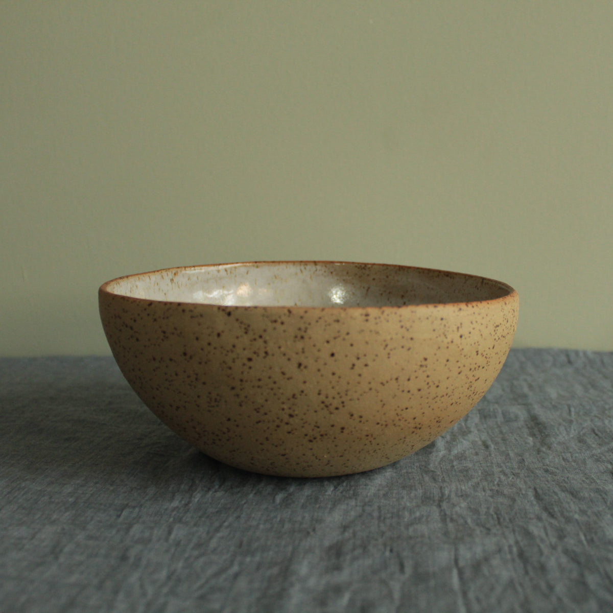Yellow bowl with silky white glaze