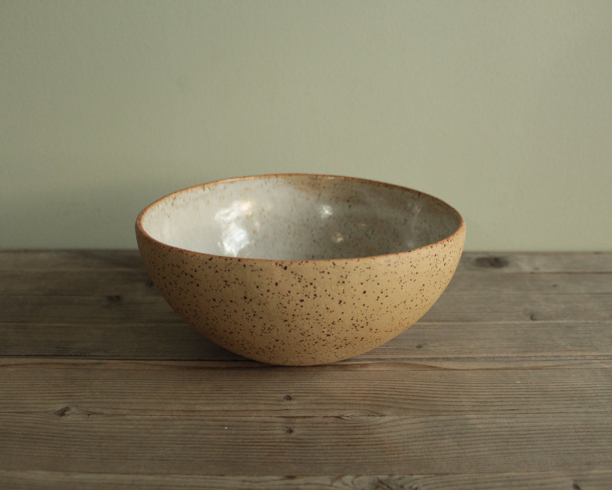 Yellow bowl with silky white glaze