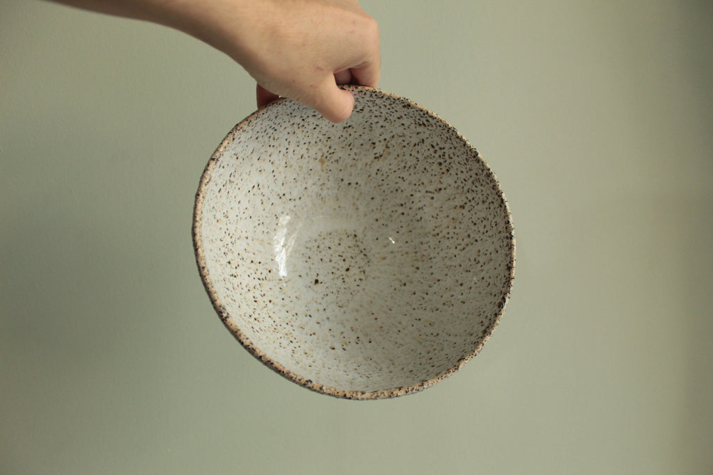 Beige bowl with silky white glaze