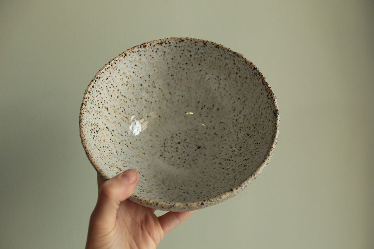 Beige bowl with silky white glaze