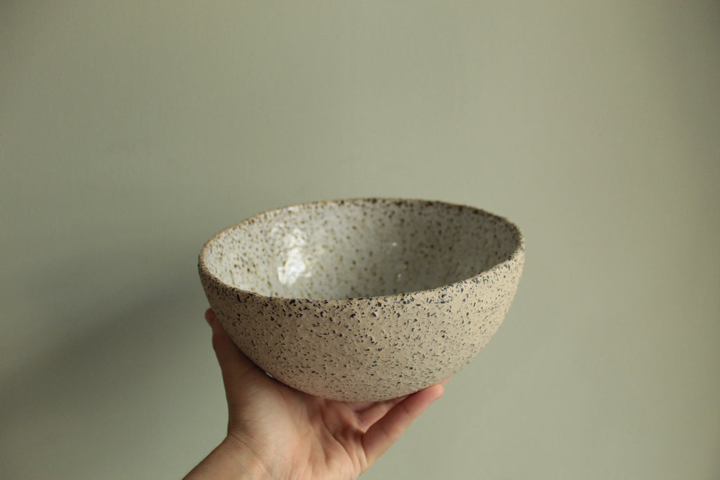 Beige bowl with silky white glaze