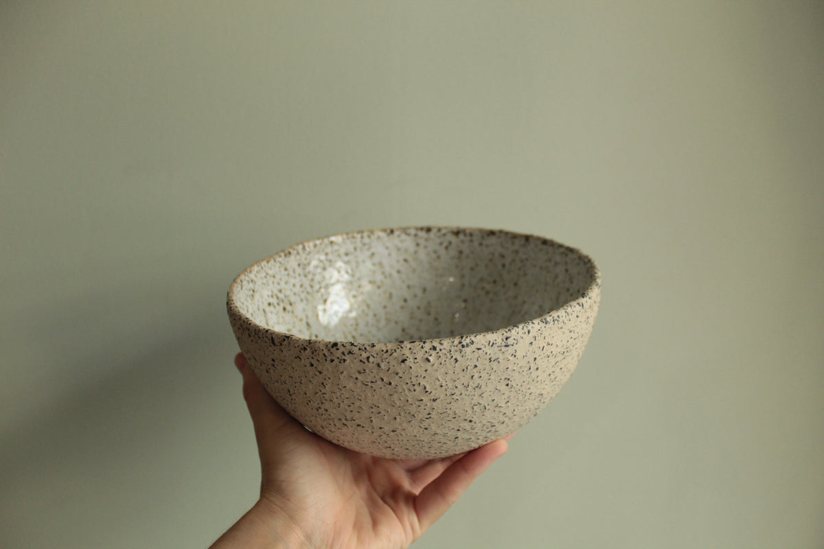 Beige bowl with silky white glaze