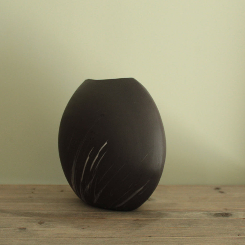Comet rain vase