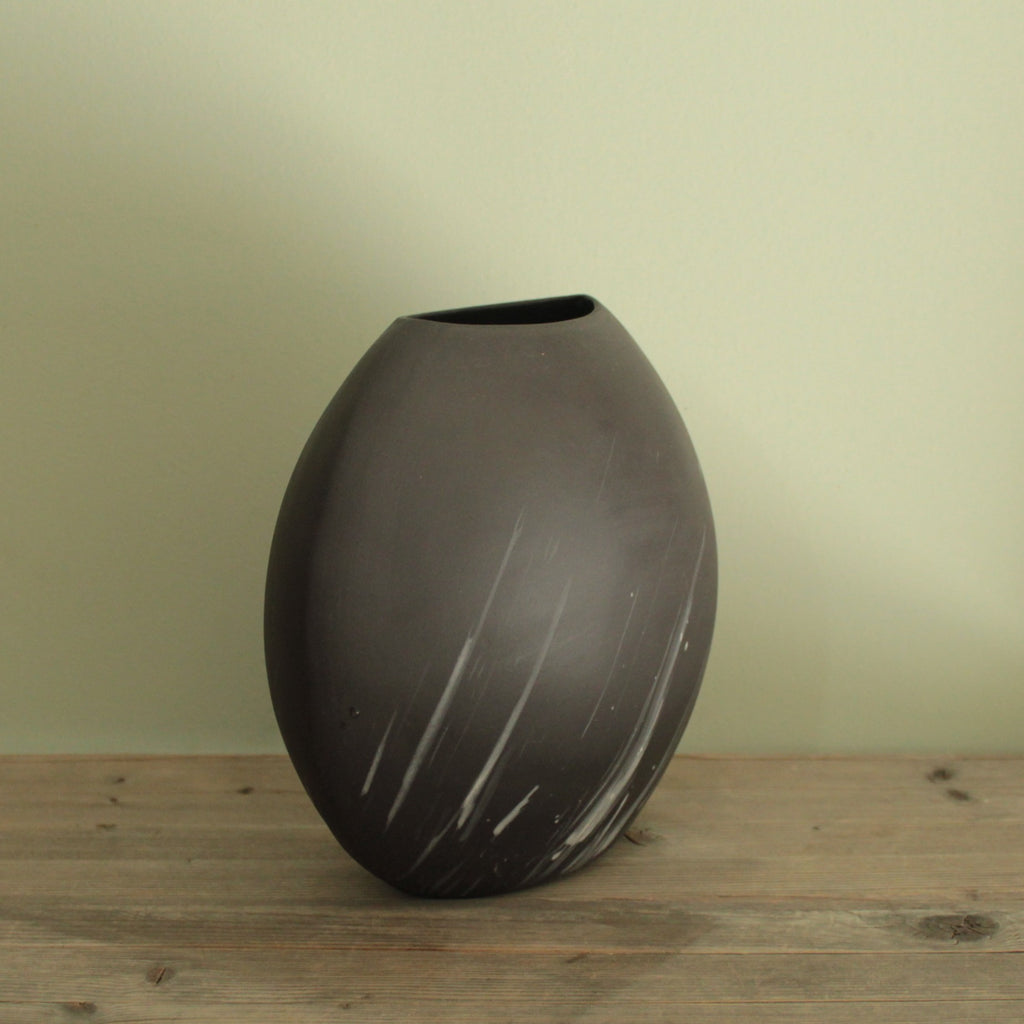 Comet rain vase