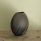 Comet rain vase