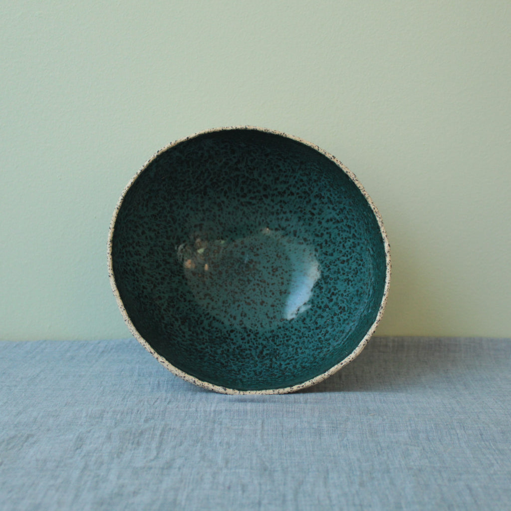 Beige bowl with botanical green glaze