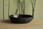 Black deep plate with texture