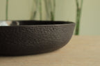 Black deep plate with texture