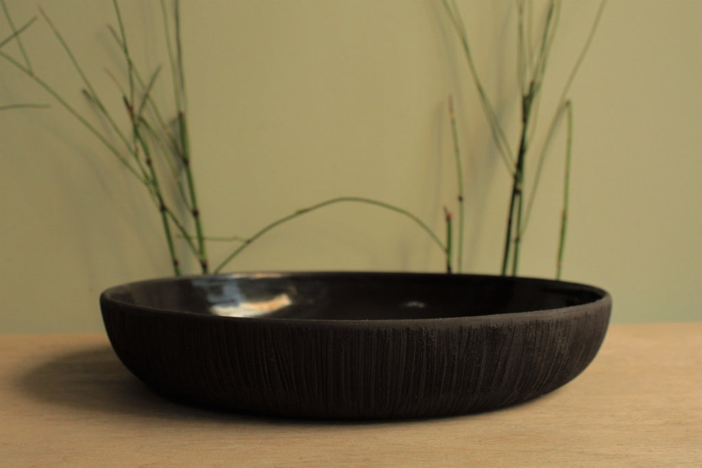 Black platter with texture