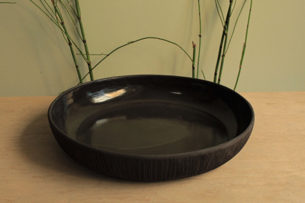Black platter with texture
