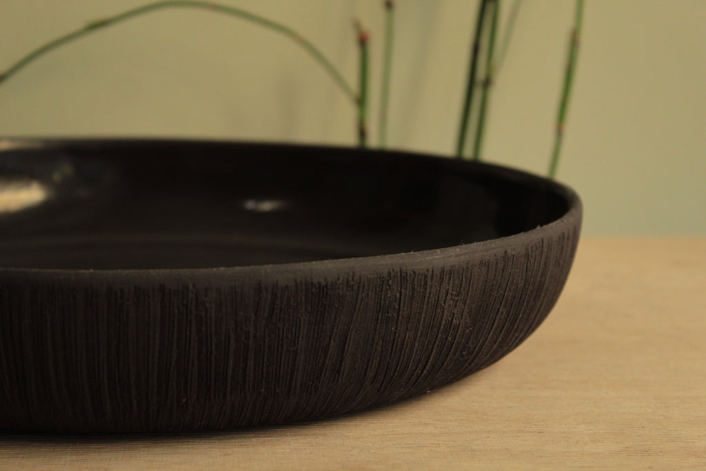 Black platter with texture