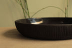 Black platter with texture