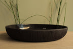 Black platter with texture