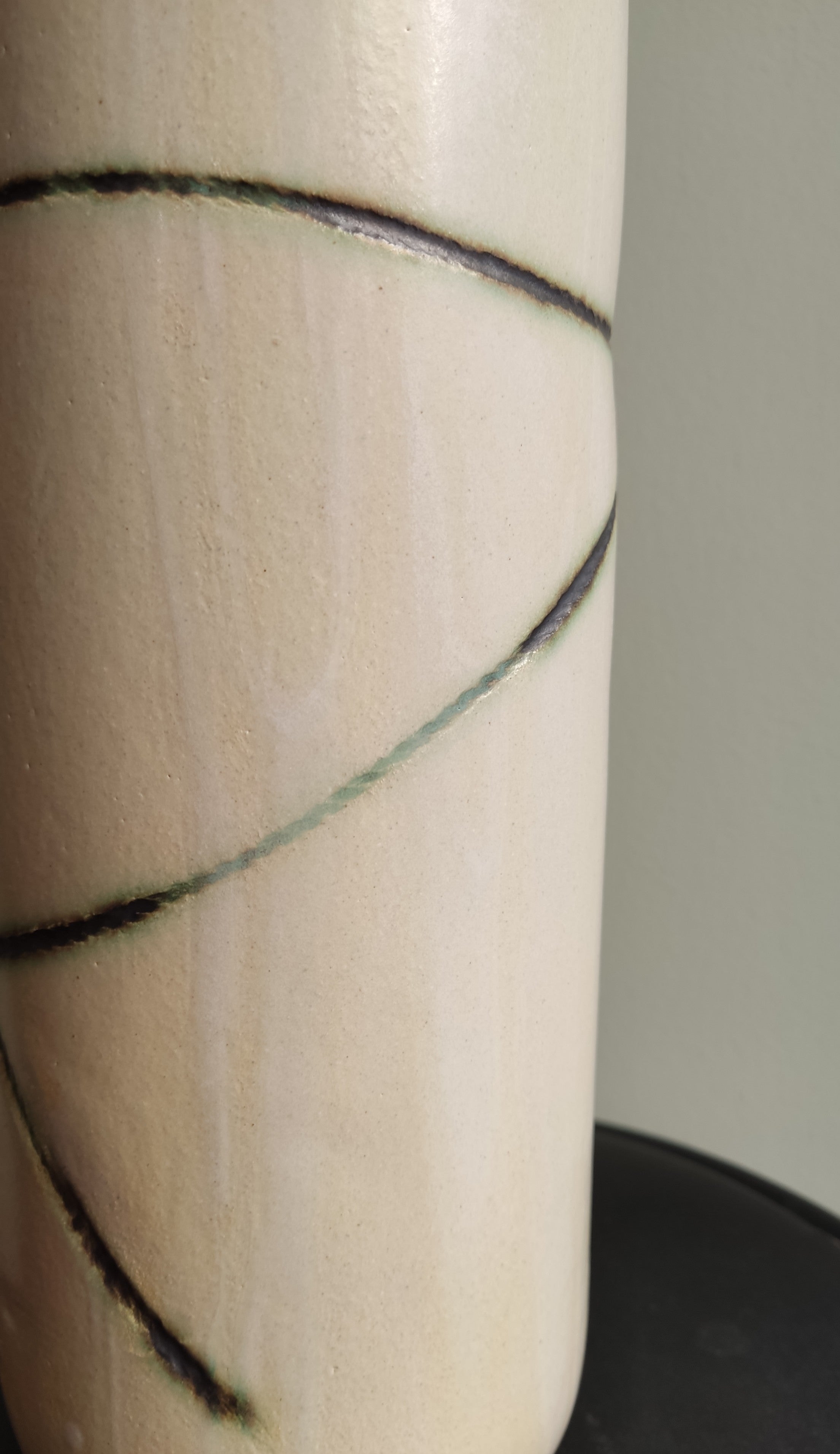White vase with green texture
