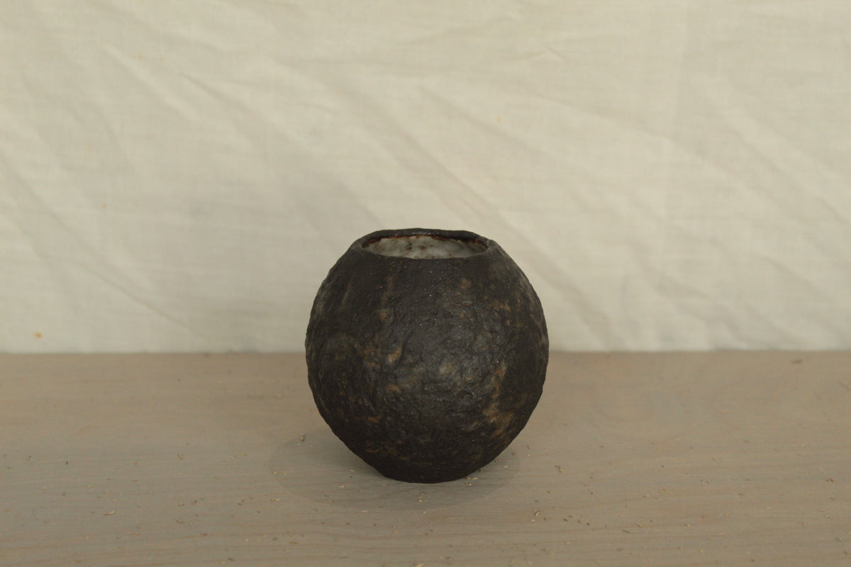 Small black vase