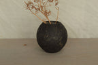 Small black vase