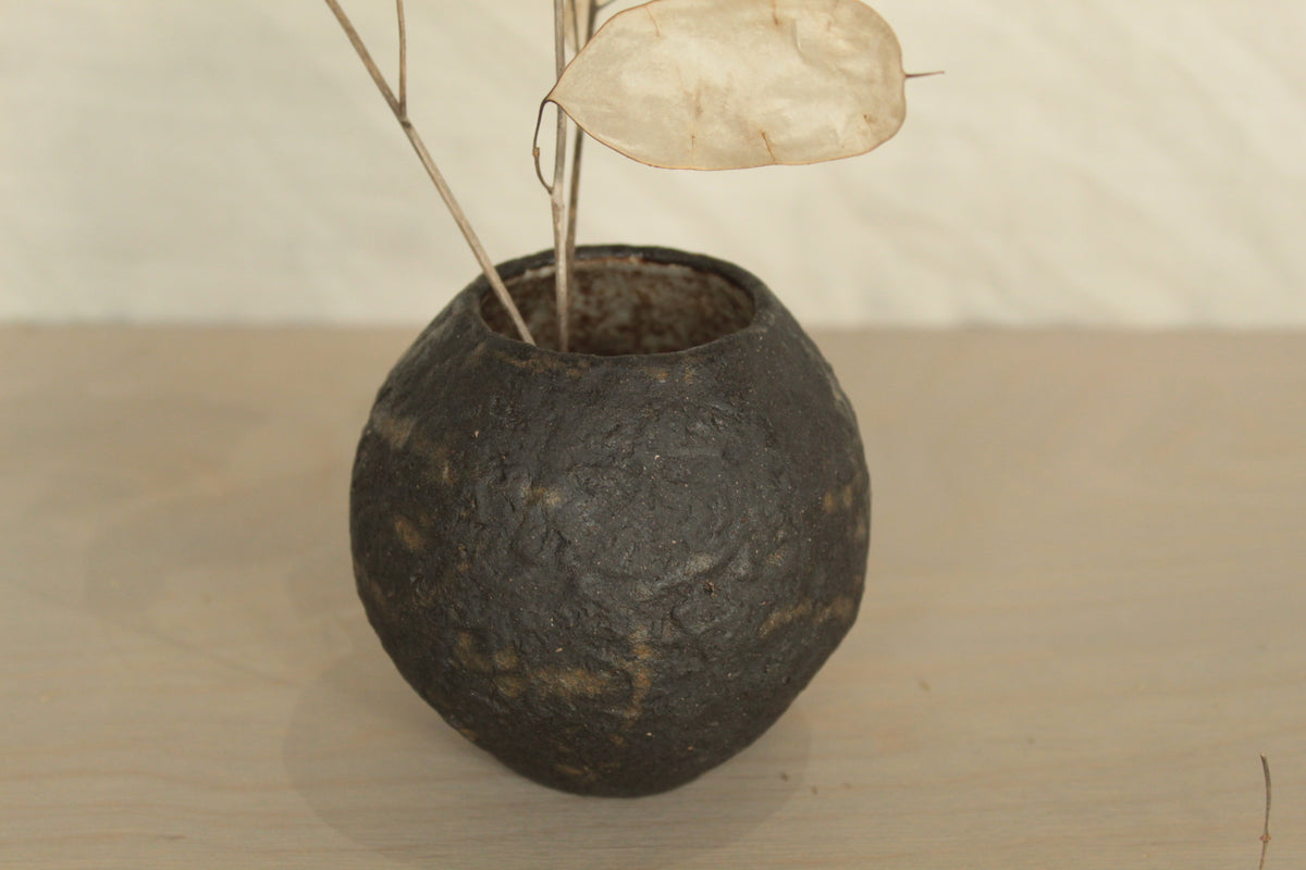 Small black vase