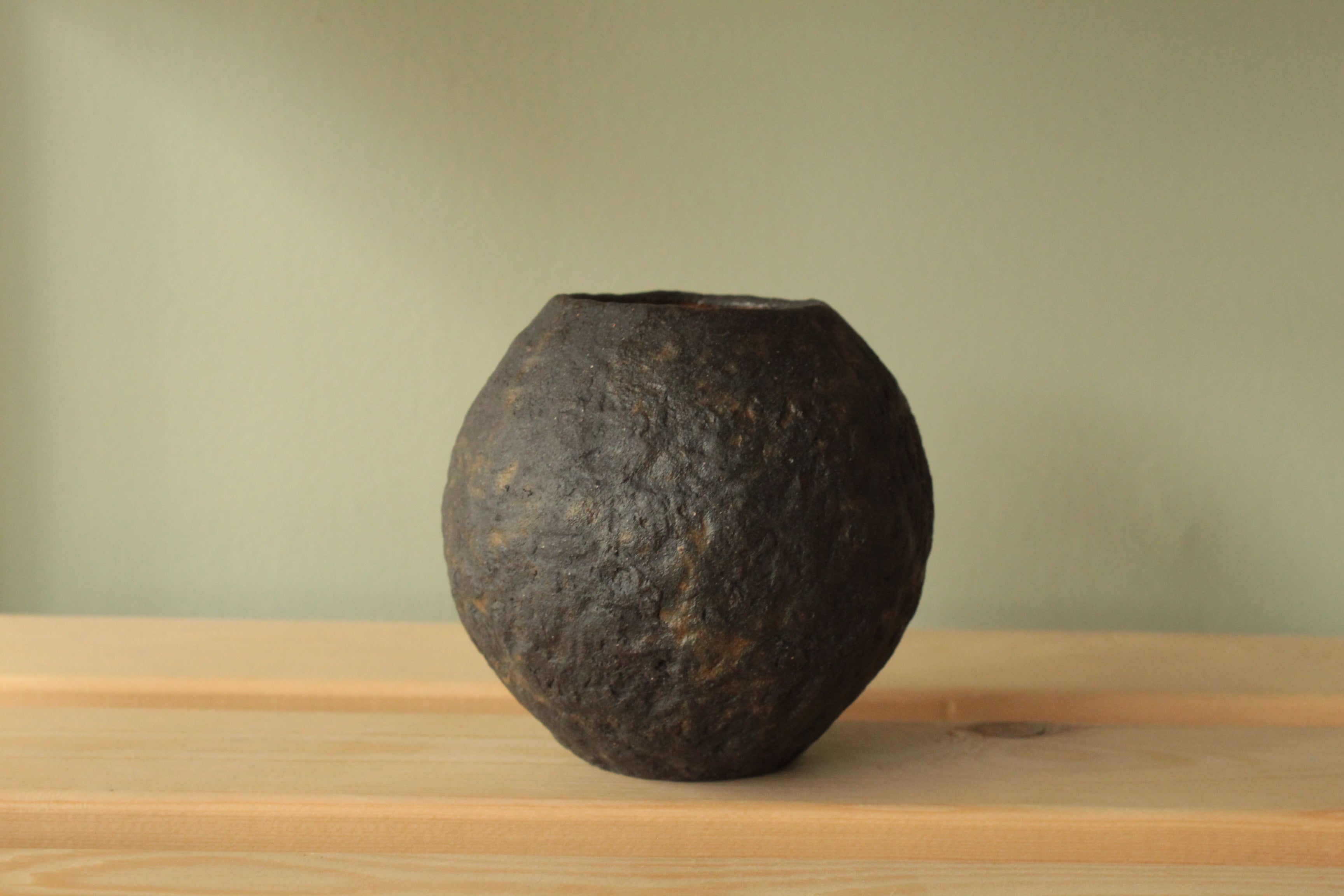 Small black vase