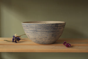 White serving bowl with blue texture