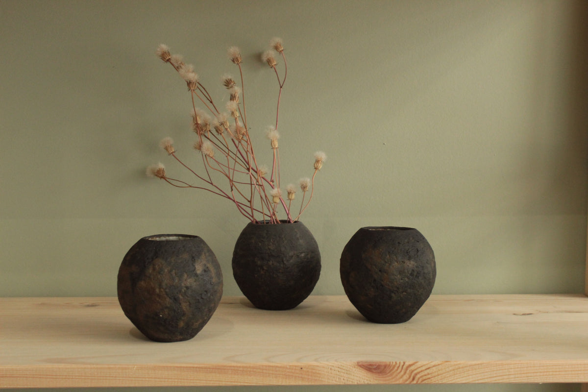 Small black vase