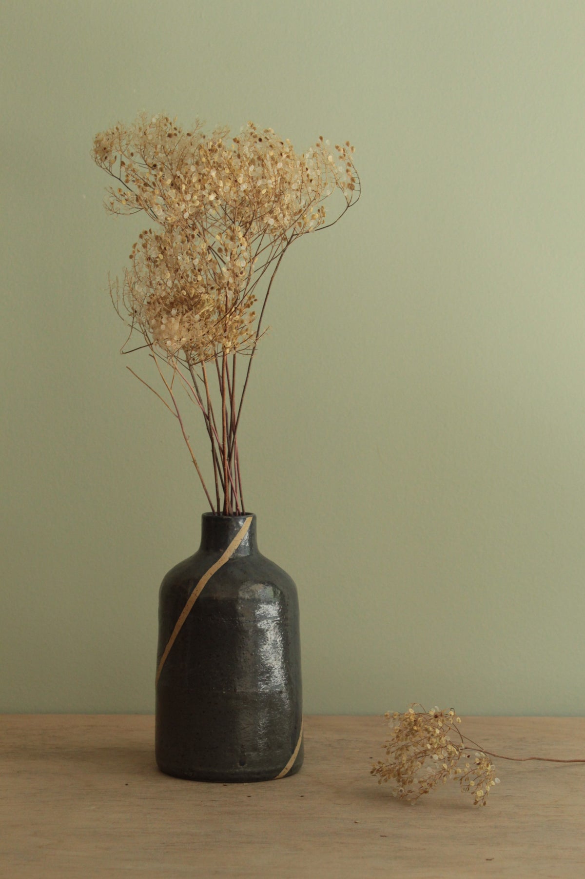 Blue bottle or vase with stripe