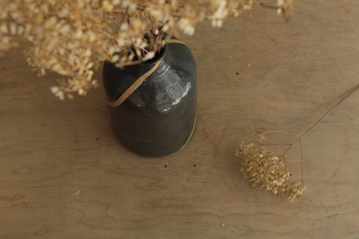 Blue bottle or vase with stripe