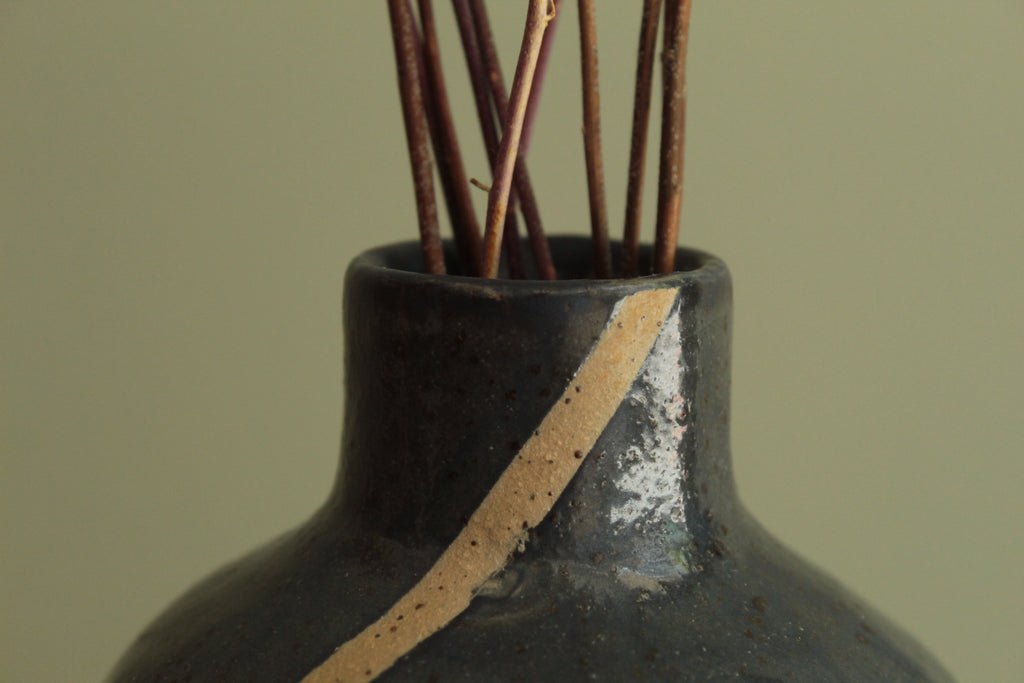 Blue bottle or vase with stripe
