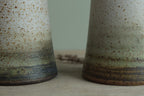 Narrow white speckled vase