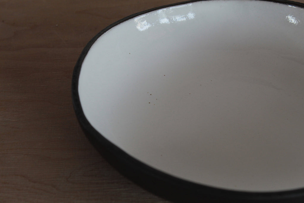 Black and white pasta plate