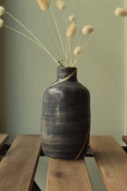 Blue bottle or vase with stripe