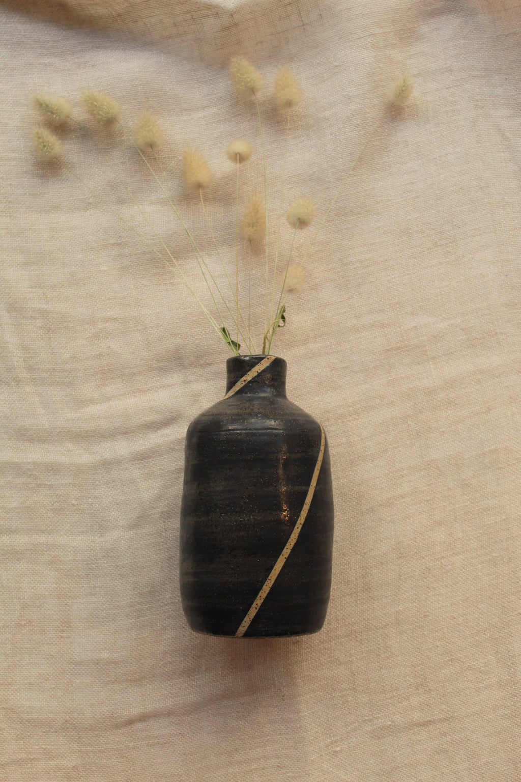 Blue bottle or vase with stripe